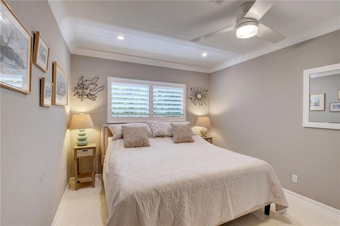 1163 Mulberry Way Boca Raton, FL 33486 - Photo 62 of 66 a bedroom with a bed and a window