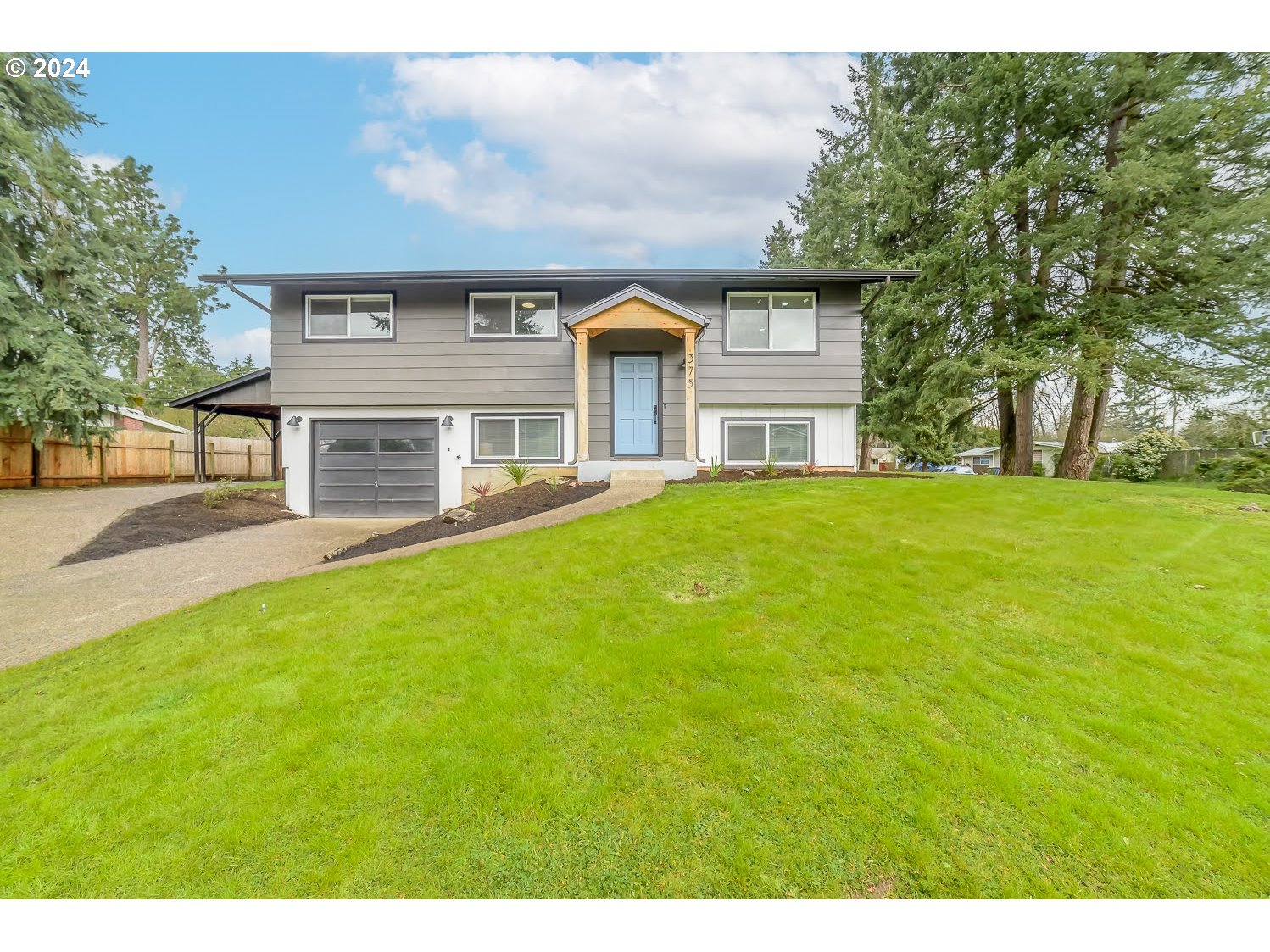 375 Heritage Avenue Eugene, OR 97404 - Photo 1 of 32 a front view of a house with a yard