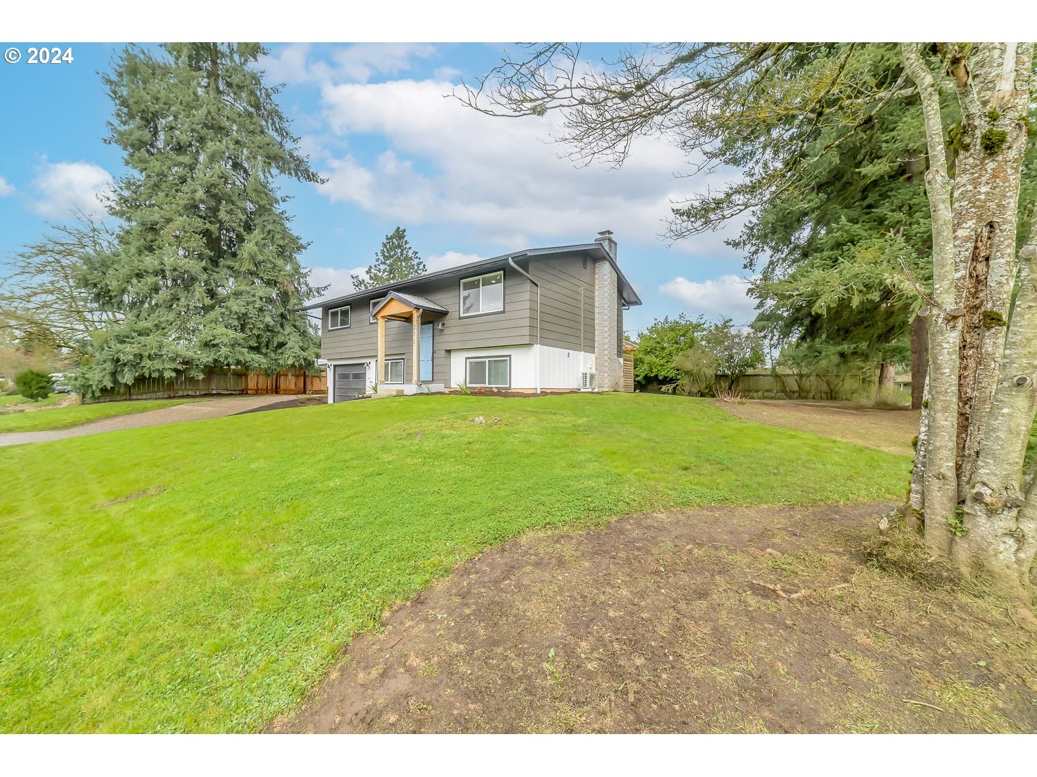 375 Heritage Avenue Eugene, OR 97404 - Photo 2 of 32 a view of a house with yard and tree s