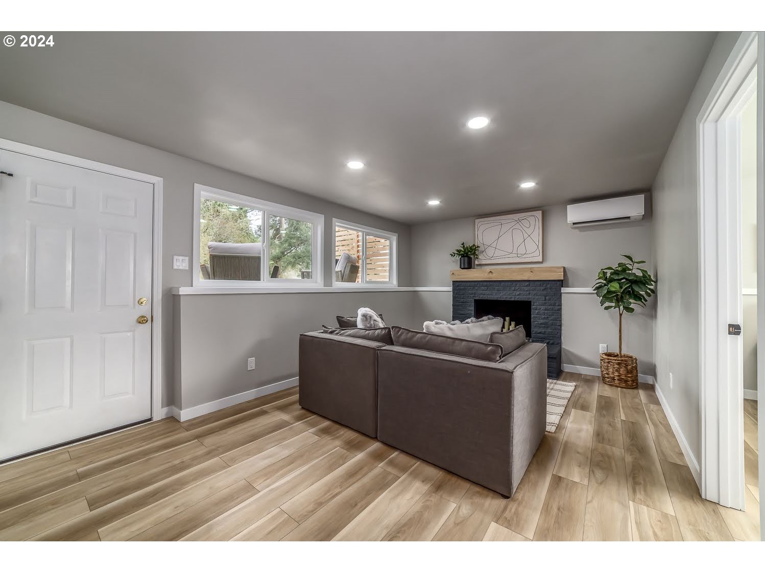 375 Heritage Avenue Eugene, OR 97404 - Photo 22 of 32 a living room with a couch and a fireplace