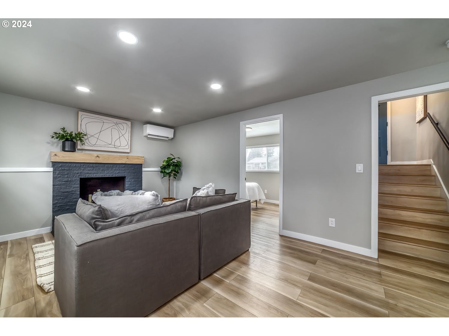 375 Heritage Avenue Eugene, OR 97404 - Photo 23 of 32 a living room with furniture and a fireplace