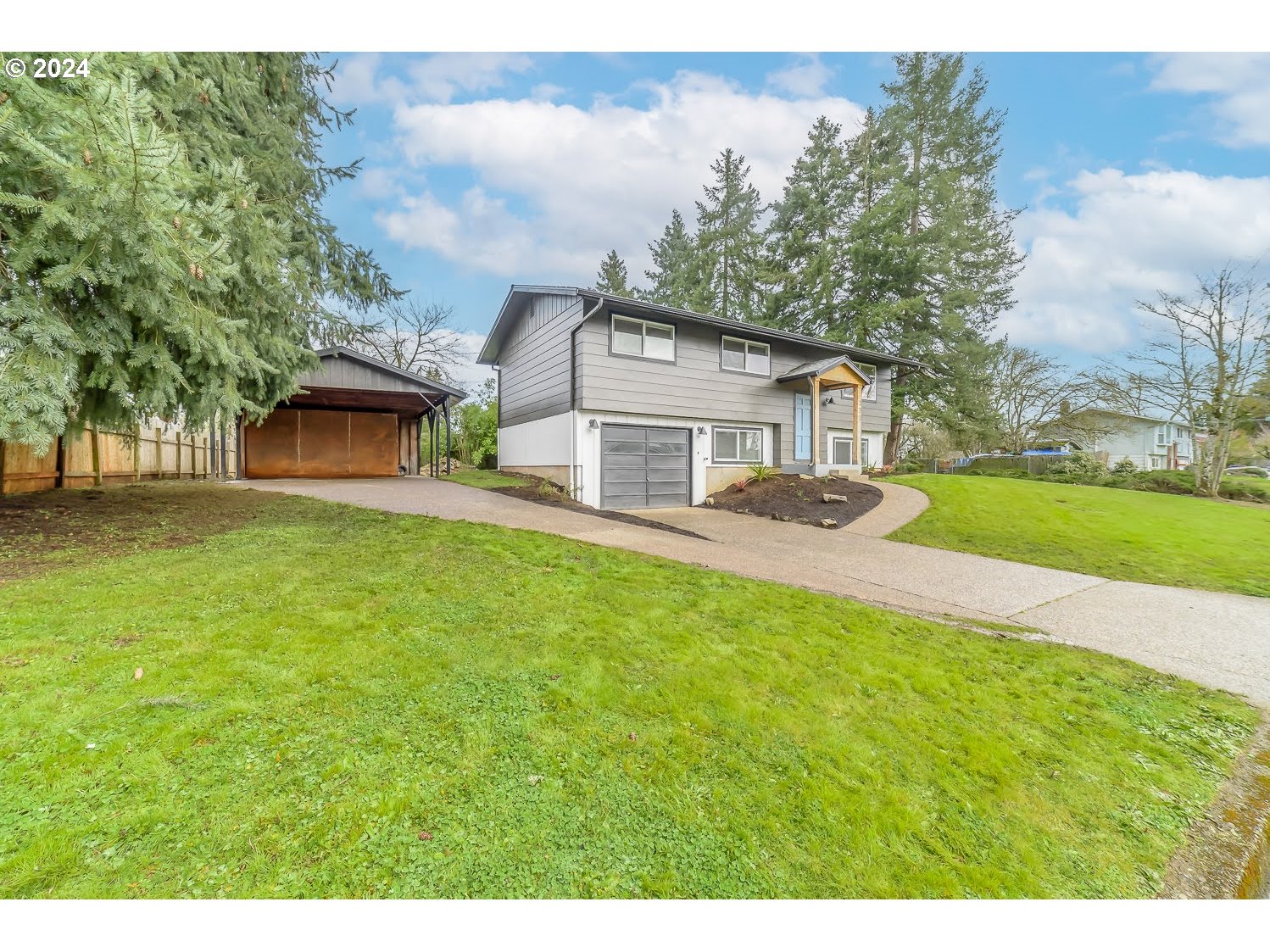 375 Heritage Avenue Eugene, OR 97404 - Photo 3 of 32 a front view of a house with a yard