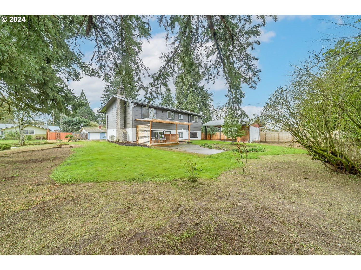 375 Heritage Avenue Eugene, OR 97404 - Photo 32 of 32 a view of a house with a big yard and large trees