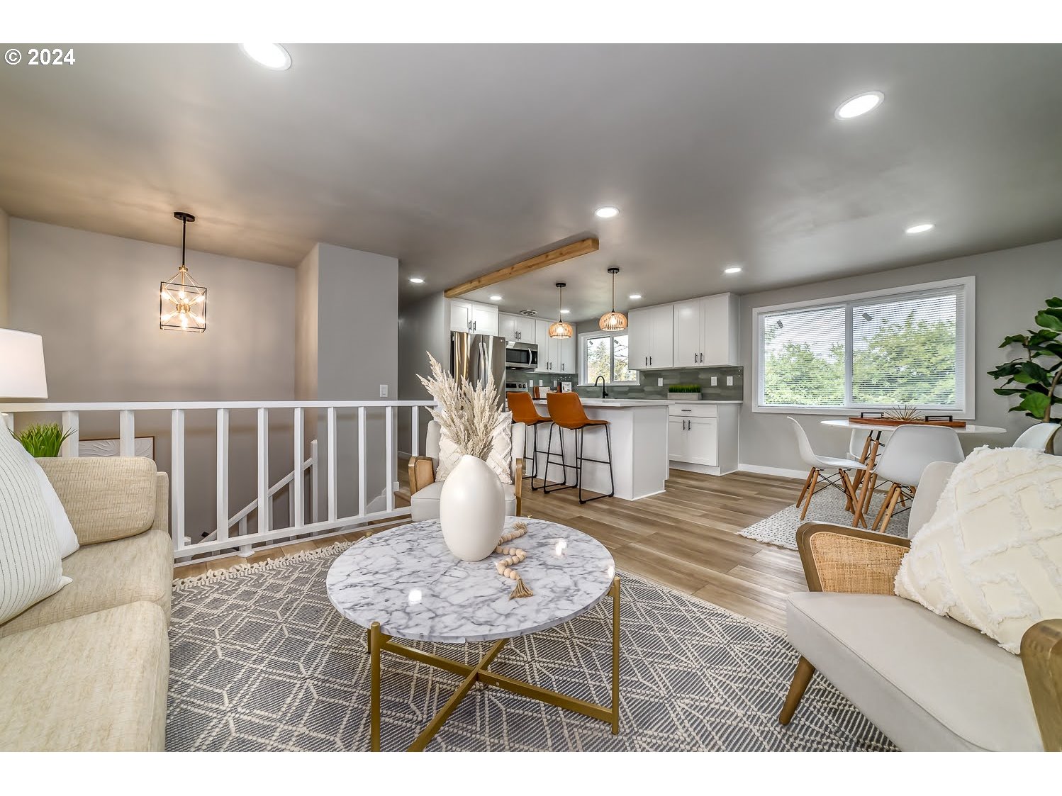 375 Heritage Avenue Eugene, OR 97404 - Photo 7 of 32 a living room with furniture and a wooden floor