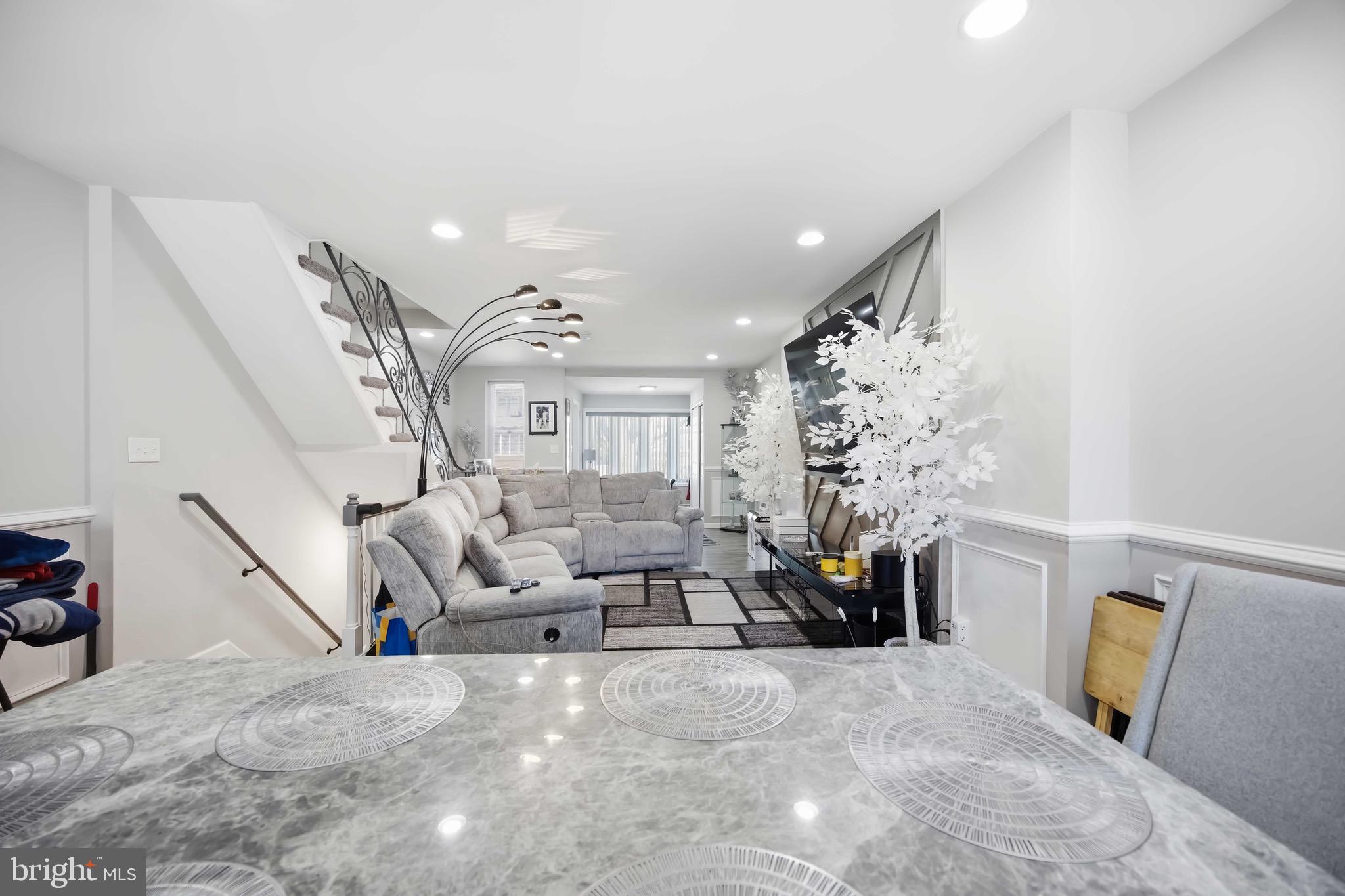 7167 Georgian Road Philadelphia, PA 19138 - Photo 11 of 34 a living room with furniture and stairs