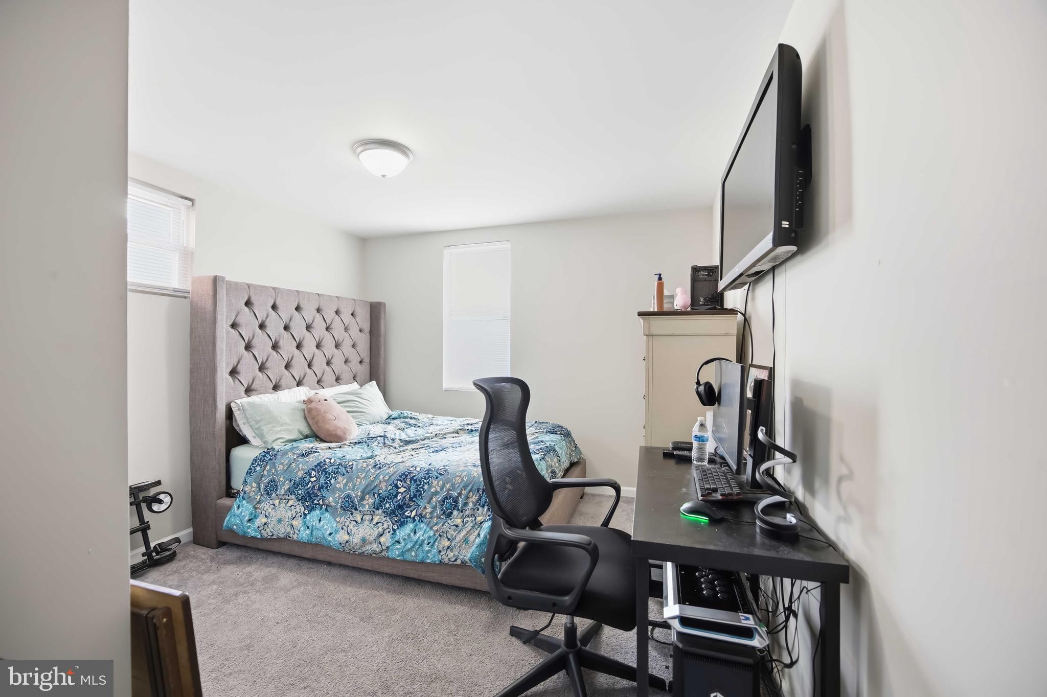 7167 Georgian Road Philadelphia, PA 19138 - Photo 23 of 34 a bedroom with furniture and a window