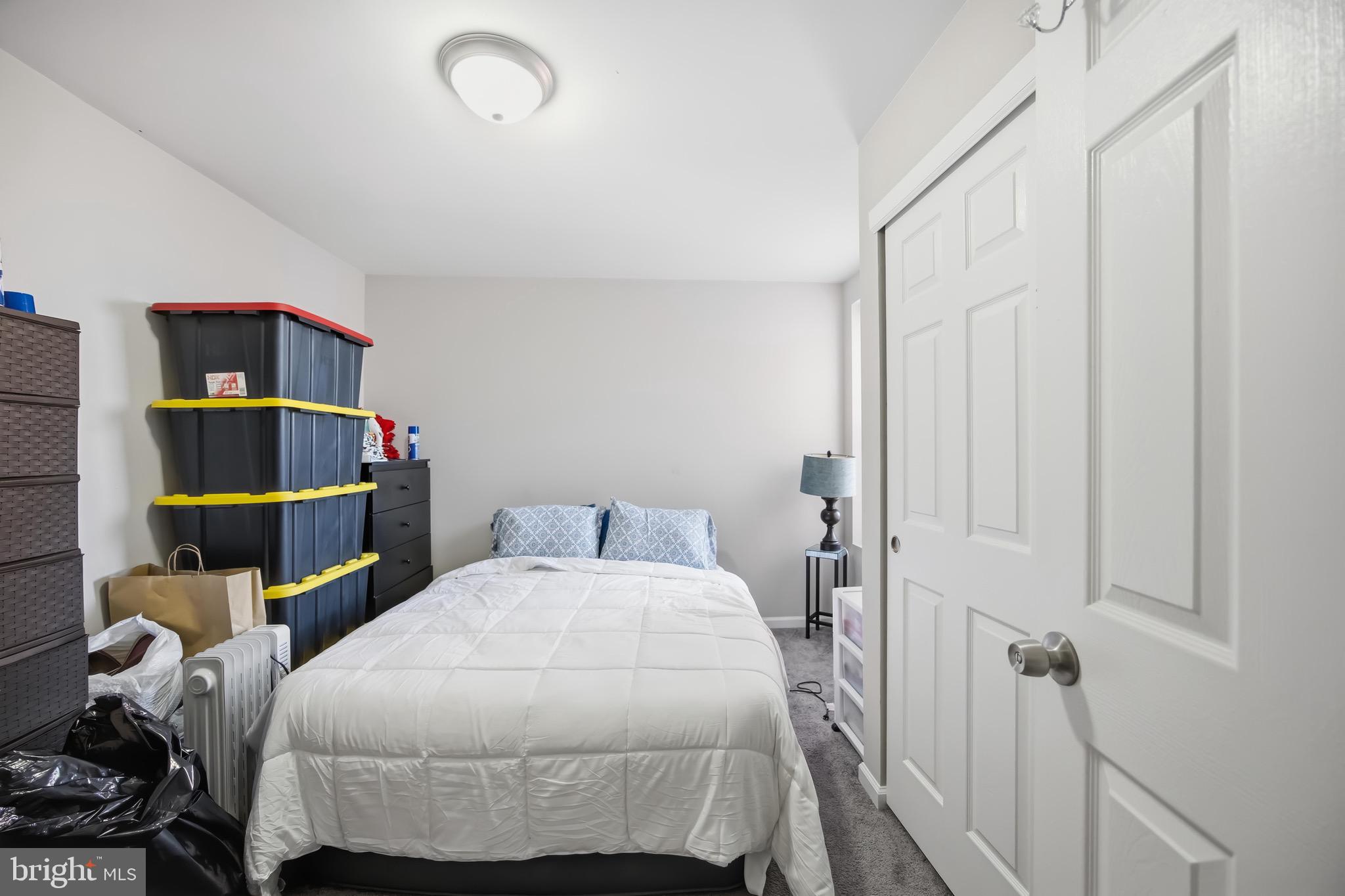 7167 Georgian Road Philadelphia, PA 19138 - Photo 25 of 34 a bedroom with a bed and a closet