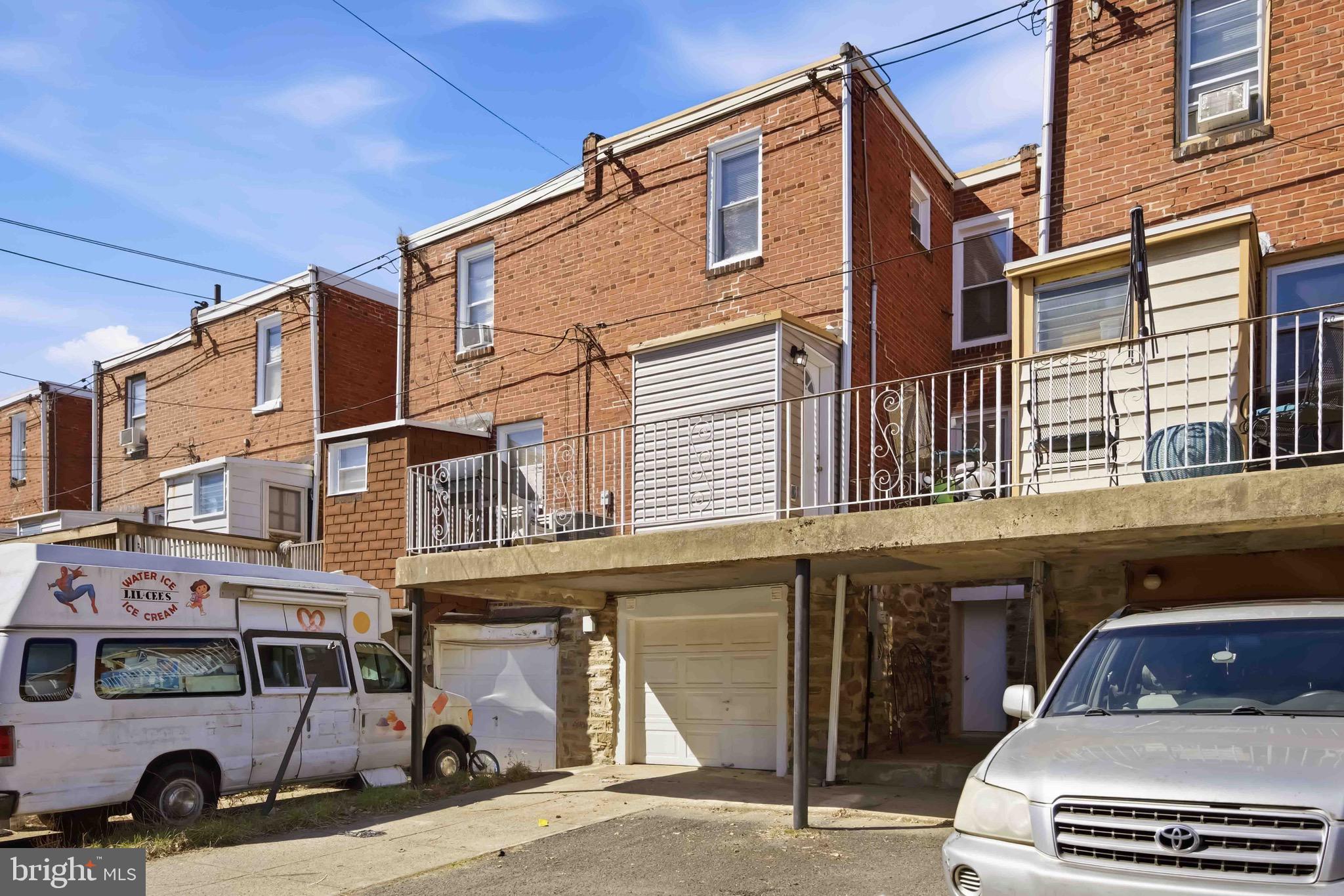 7167 Georgian Road Philadelphia, PA 19138 - Photo 34 of 34 a car parked in front of a building