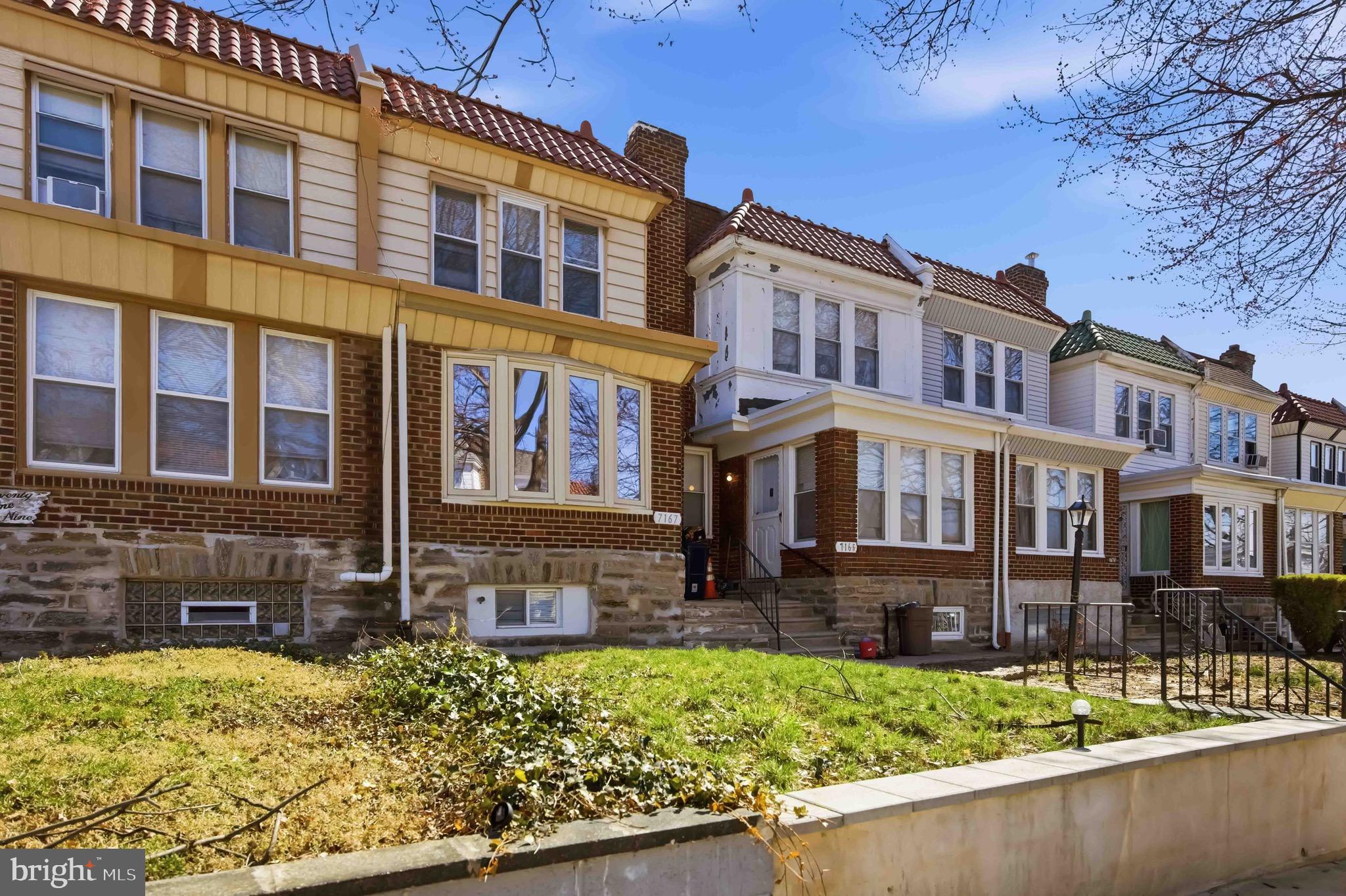 7167 Georgian Road Philadelphia, PA 19138 - Photo 4 of 34 a front view of a building with street