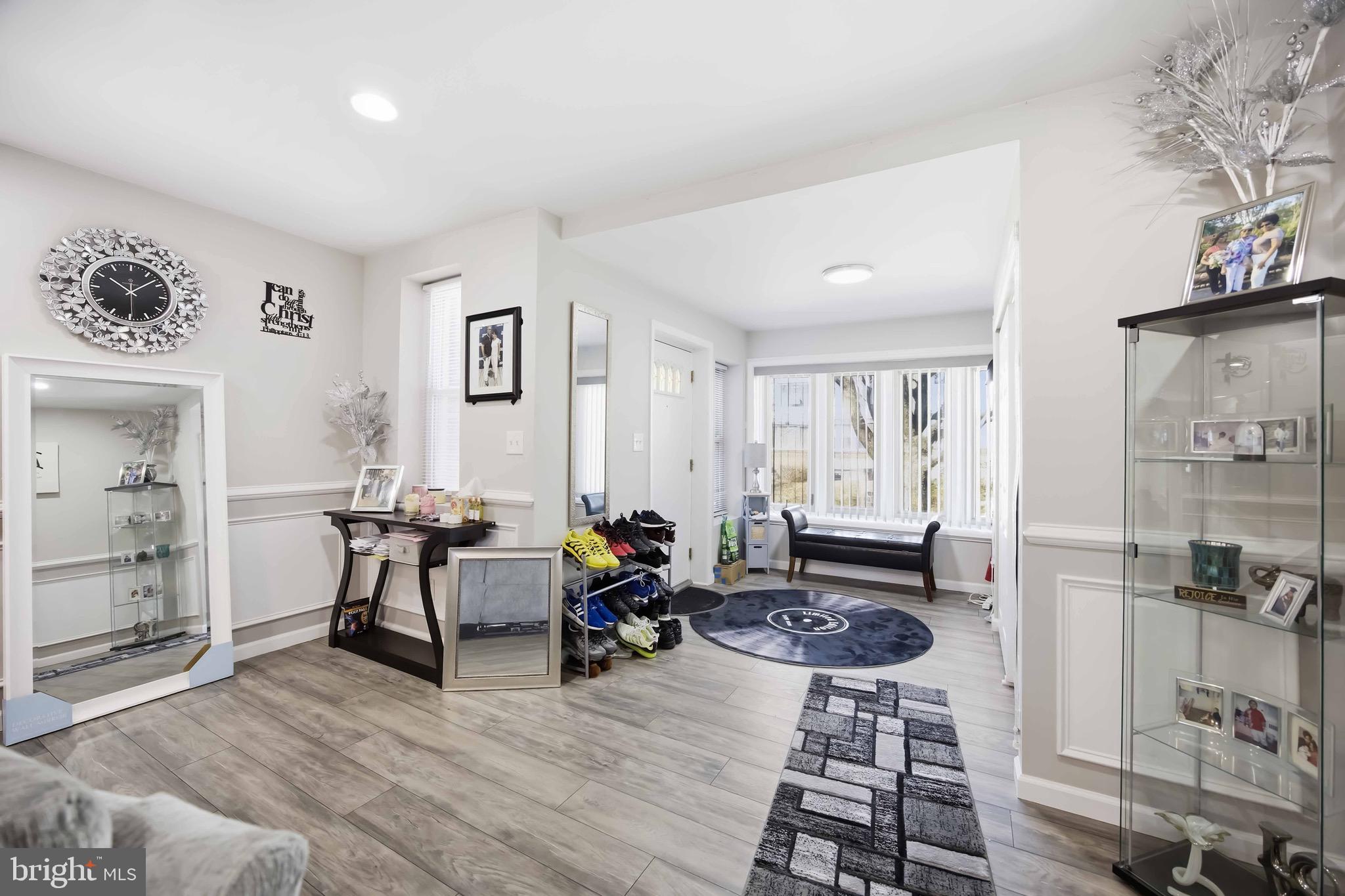 7167 Georgian Road Philadelphia, PA 19138 - Photo 5 of 34 a living room with furniture and a wooden floor