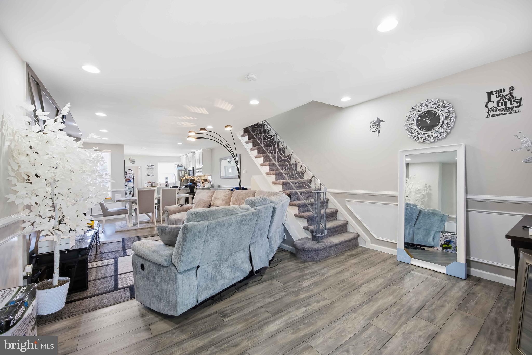 7167 Georgian Road Philadelphia, PA 19138 - Photo 6 of 34 a living room with furniture and wooden floor