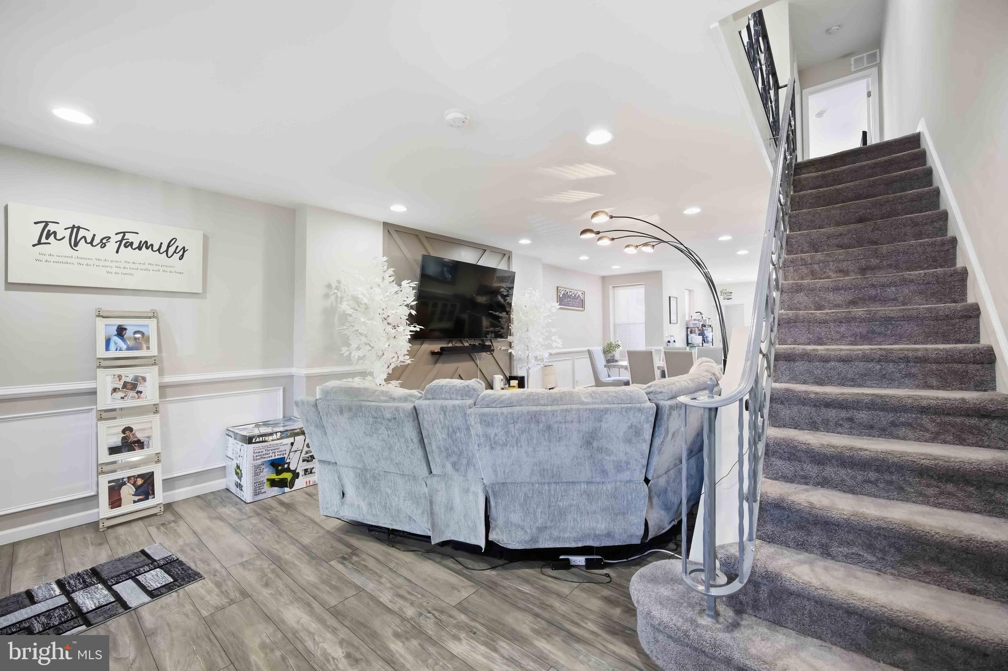 7167 Georgian Road Philadelphia, PA 19138 - Photo 7 of 34 a living room with furniture and a flat screen tv