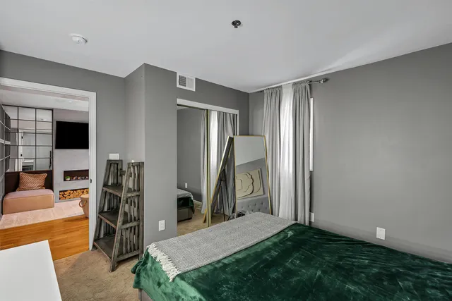 a view of a livingroom with furniture and front door