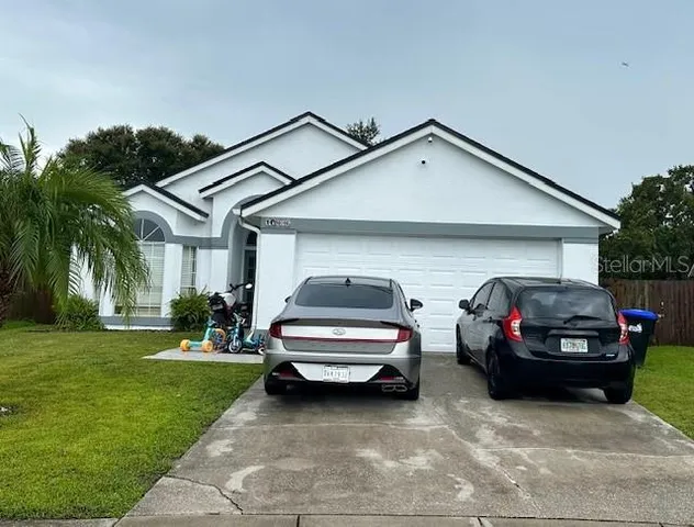 a car parked in front of a house