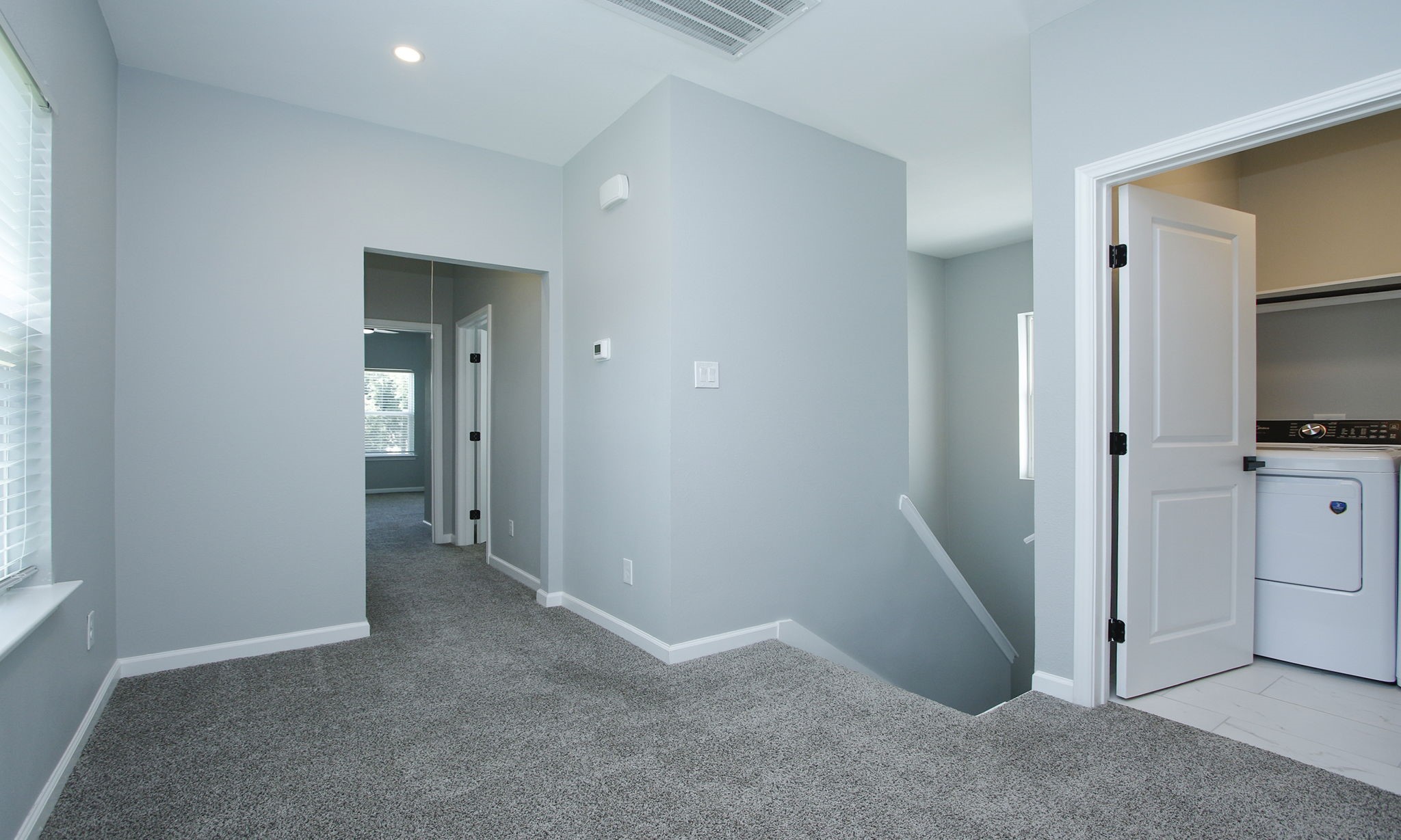 4337 Faulkner Street Houston, TX 77021 - Photo 22 of 39 a view of hallway with cabinet and flat screen tv