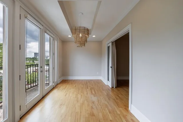 a view of gallery with wooden floor