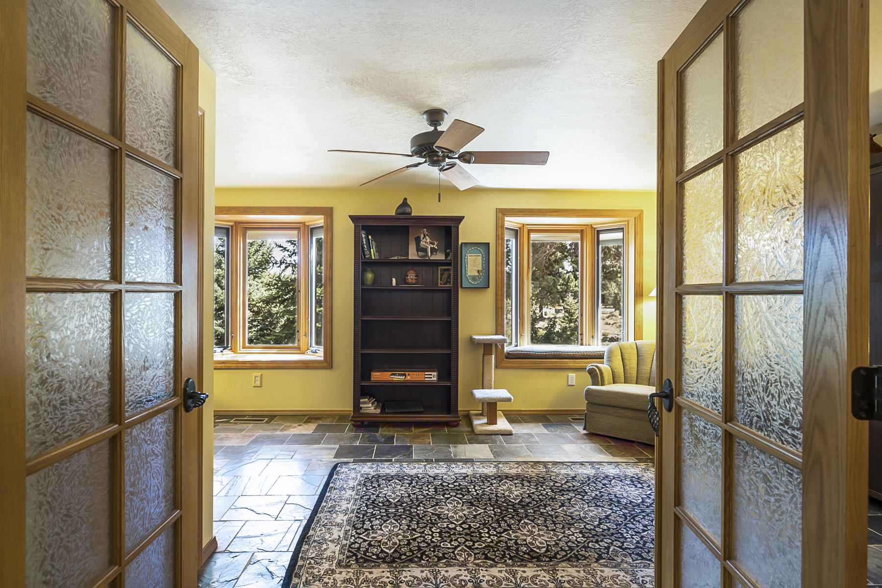 64477 Joe Neil Road Bend, OR 97701 - Photo 21 of 39 a living room with a large window