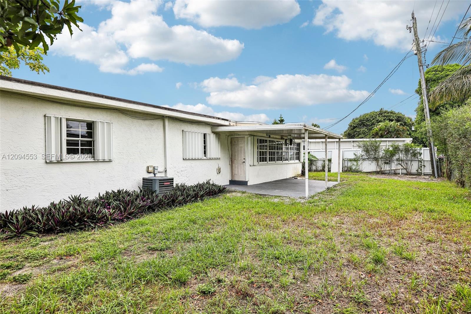 571 Northeast 172nd Street North Miami Beach, FL 33162 - Photo 25 of 33 Backyard, unstaged (same view as photo 5)