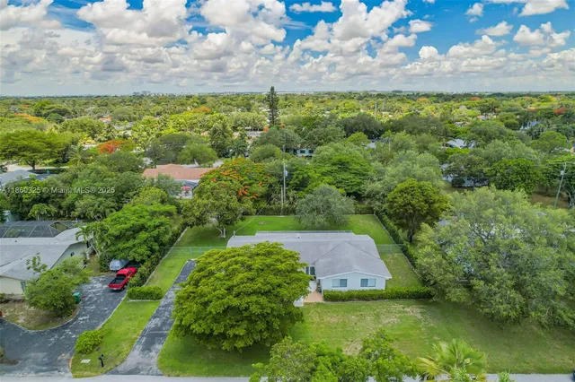 a view of a garden with an outdoor space