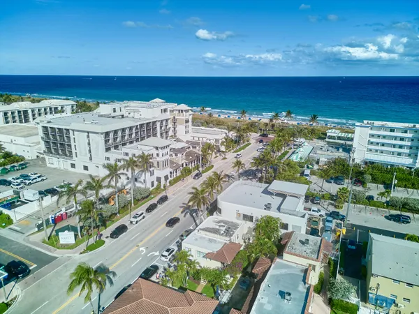 a view of a city with an ocean view