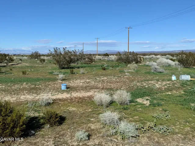 a view of a field with an outdoor space