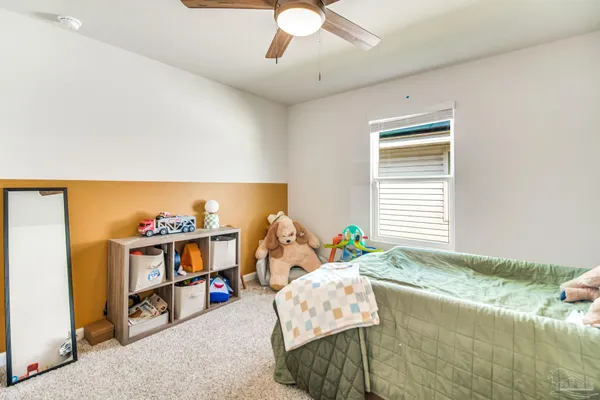 a kitchen with stainless steel appliances granite countertop a stove a sink a refrigerator and a microwave