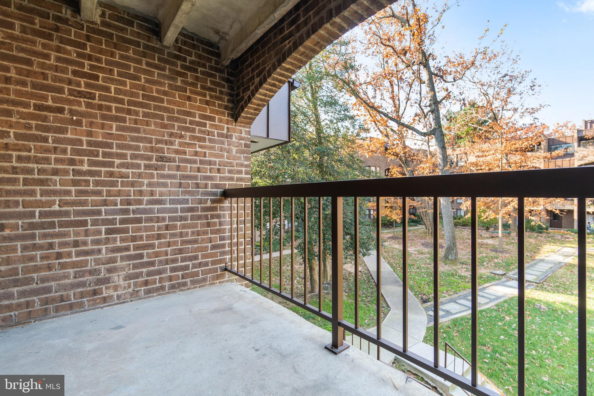 11232 Chestnut Grove Square, Unit 11232233 Reston, VA 20190 - Photo 19 of 20 Balcony off of living room