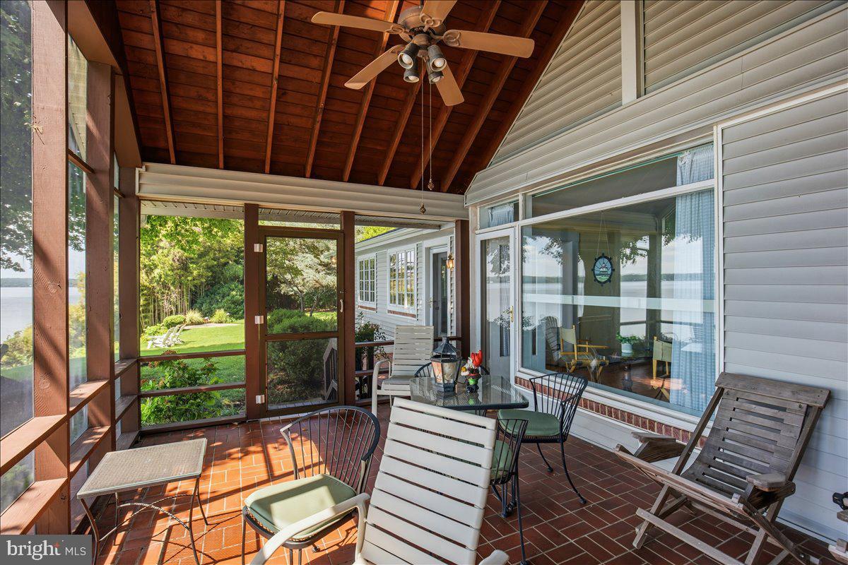 6110 Sheridan Point Road Prince Frederick, MD 20678 - Photo 40 of 77 Serene lakeside porch retreat.