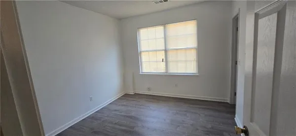 an empty room with windows