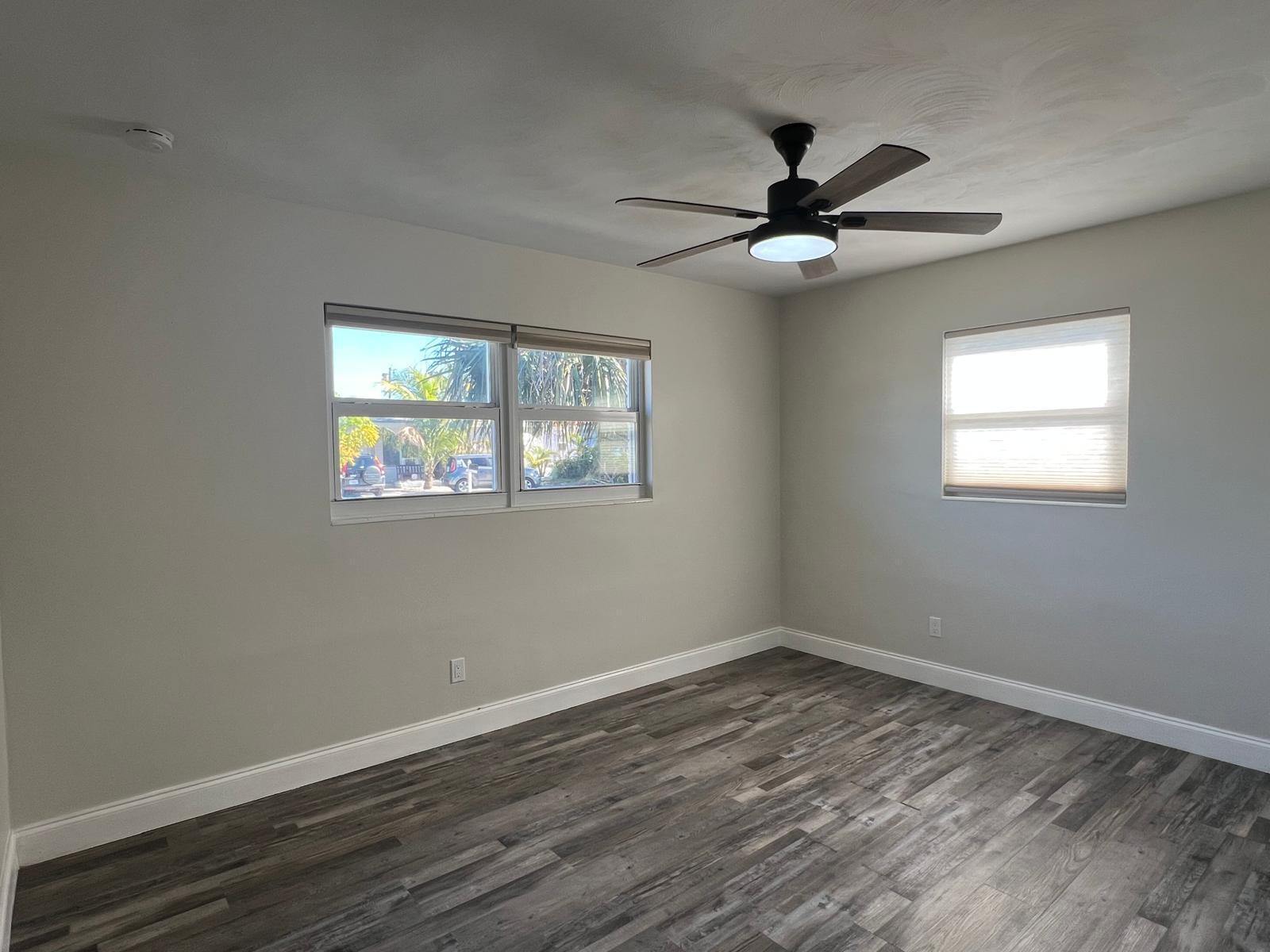 1625 North M Street Lake Worth Beach, FL 33460 - Photo 18 of 23 a view of empty room with wooden floor and fan