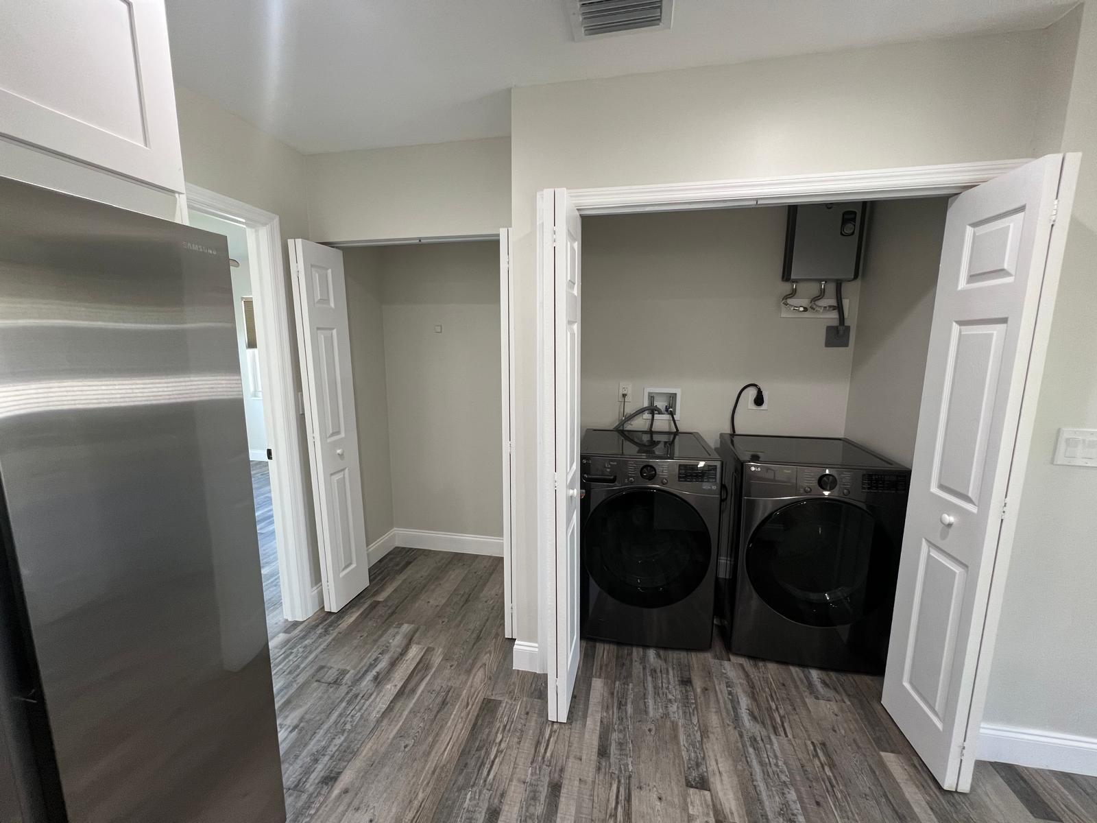 1625 North M Street Lake Worth Beach, FL 33460 - Photo 7 of 23 a view of a storage & utility room with wooden floor