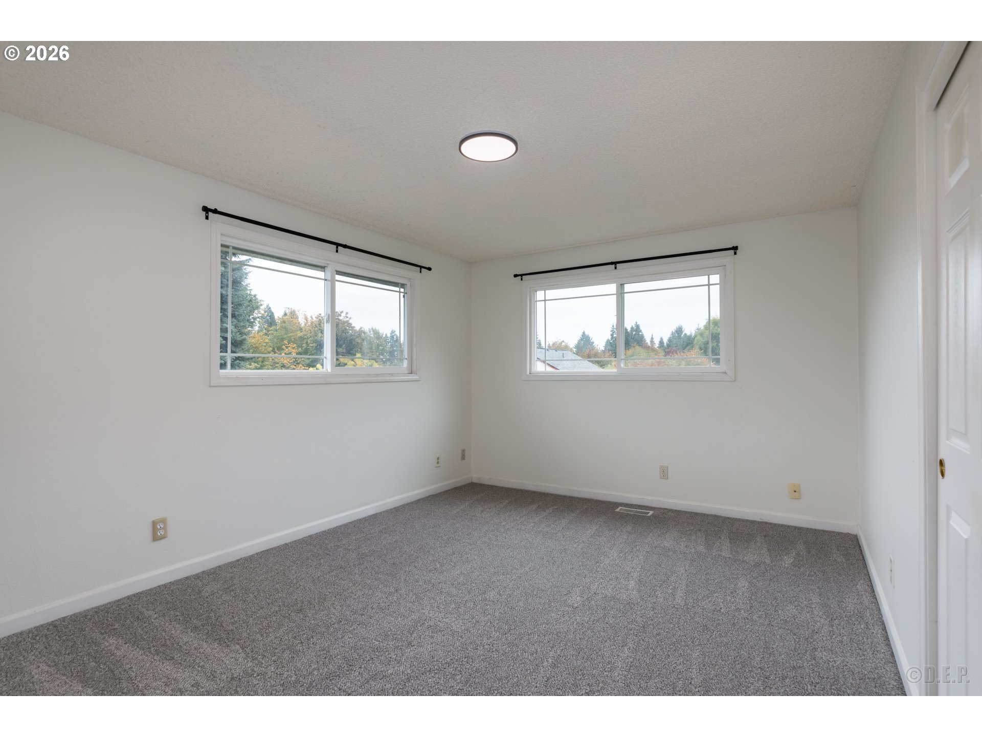 32859 Northwest Overlook Street Scappoose, OR 97056 - Photo 11 of 16 a view of an empty room with a window