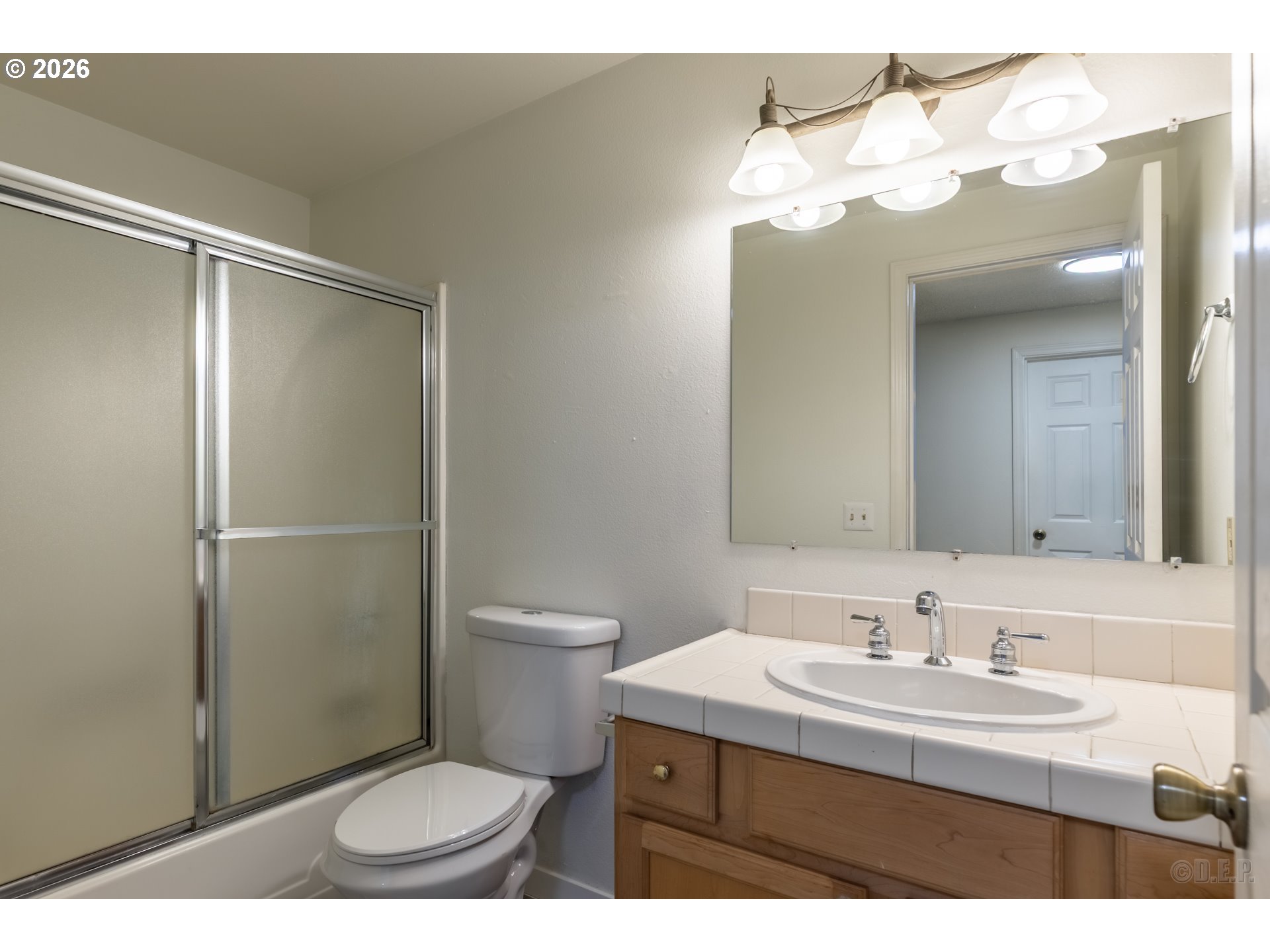 32859 Northwest Overlook Street Scappoose, OR 97056 - Photo 12 of 16 a bathroom with a sink toilet and a mirror
