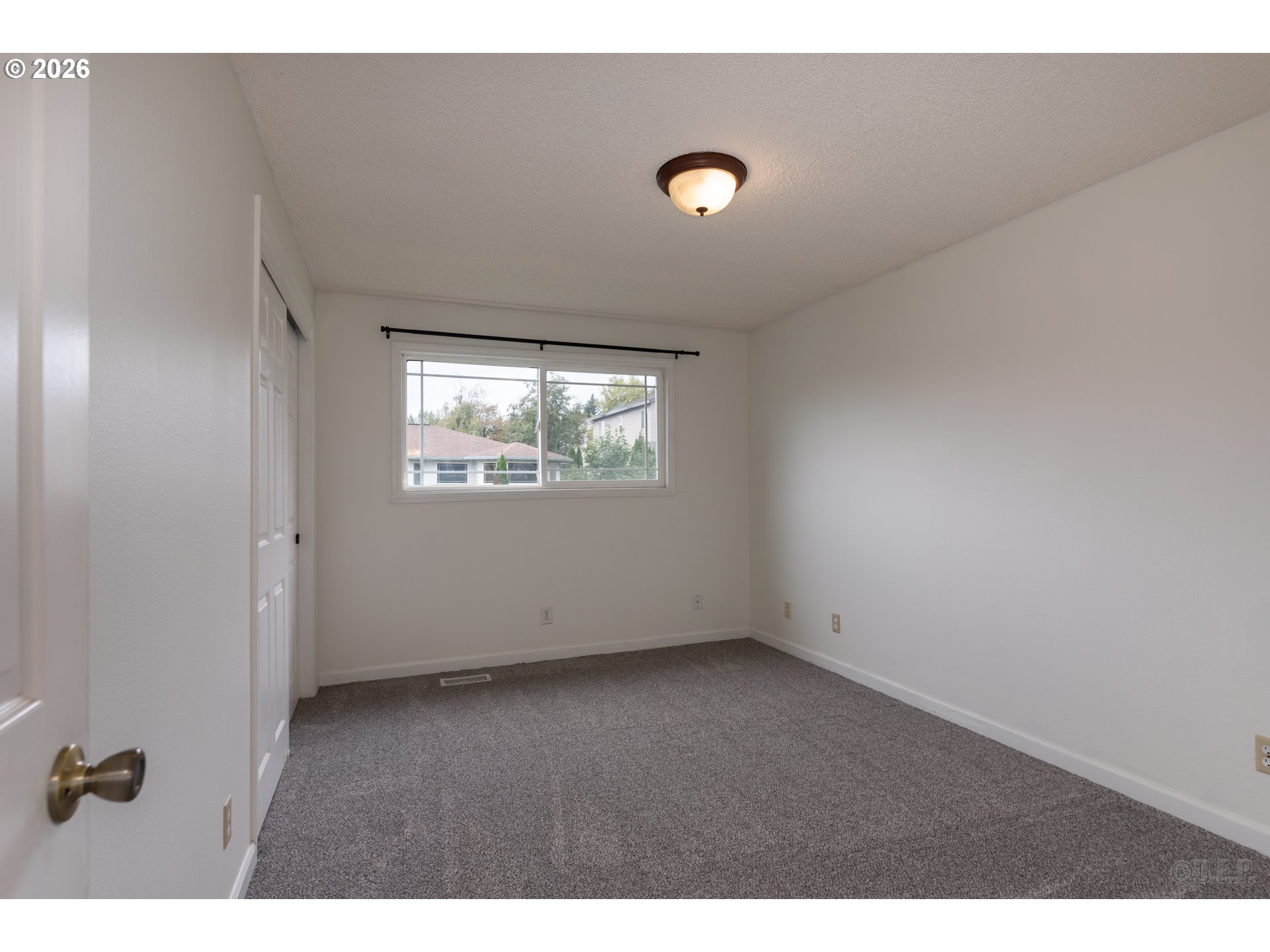32859 Northwest Overlook Street Scappoose, OR 97056 - Photo 13 of 16 a view of an empty room with a window