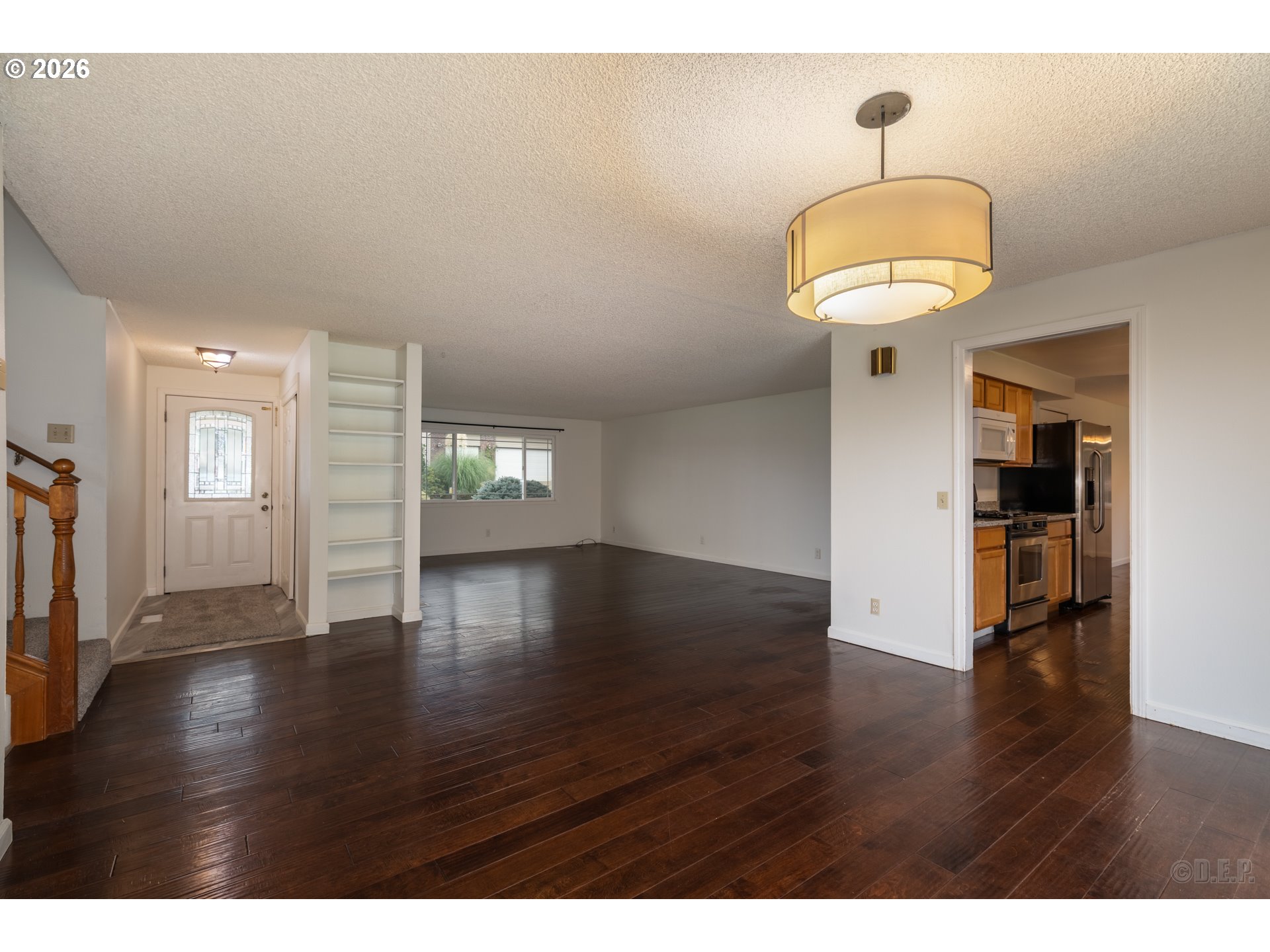 32859 Northwest Overlook Street Scappoose, OR 97056 - Photo 5 of 16 a view of empty room with wooden floor