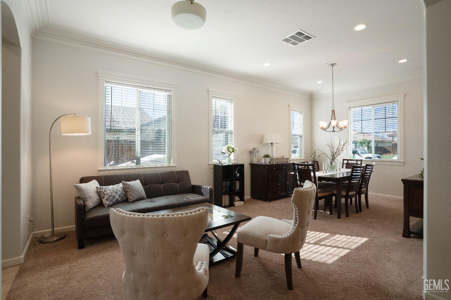 Undisclosed Address Bakersfield, CA 93314 - Photo 16 of 42 a living room with furniture and a large window