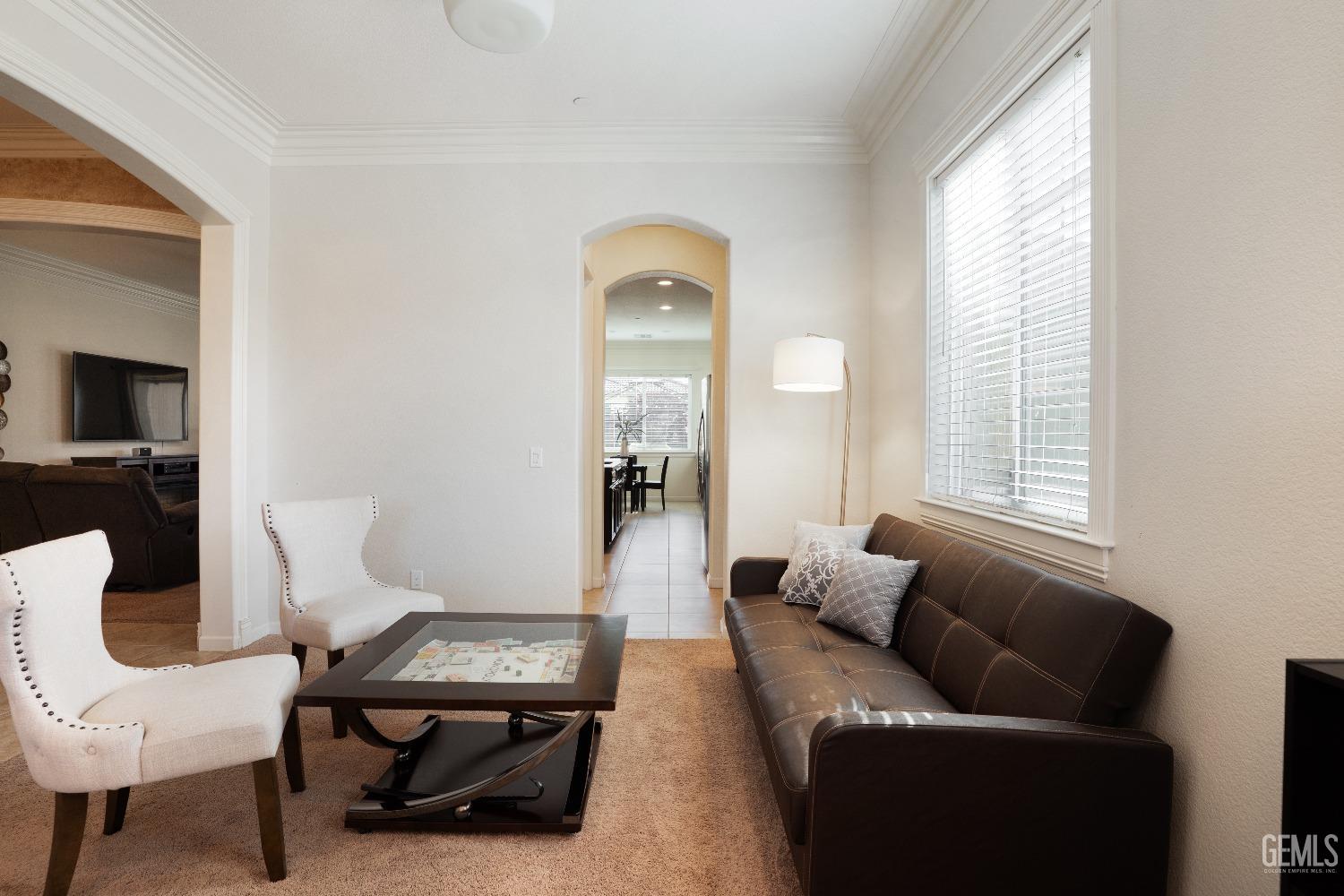 Undisclosed Address Bakersfield, CA 93314 - Photo 17 of 42 a living room with furniture and a window
