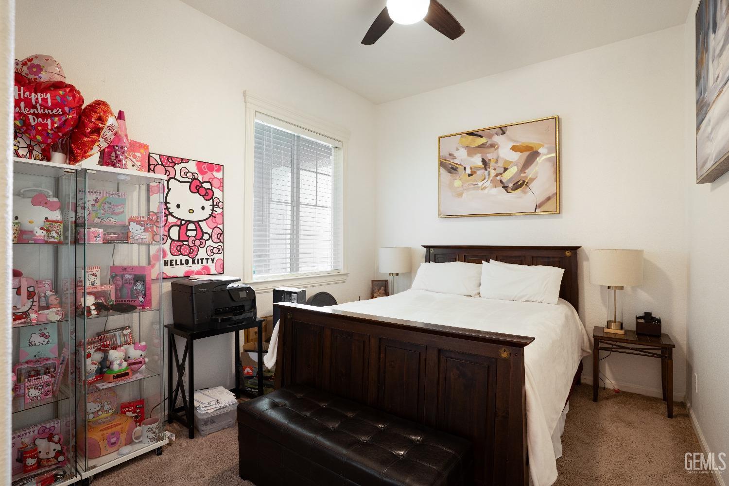 Undisclosed Address Bakersfield, CA 93314 - Photo 20 of 42 a bed room with a bed and a chair