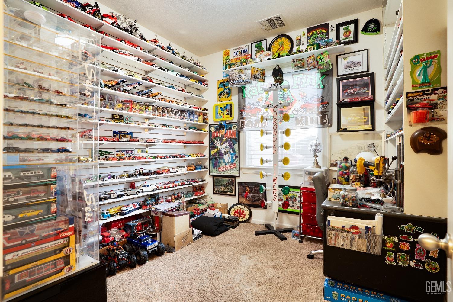 Undisclosed Address Bakersfield, CA 93314 - Photo 25 of 42 a view of a room with gym equipment