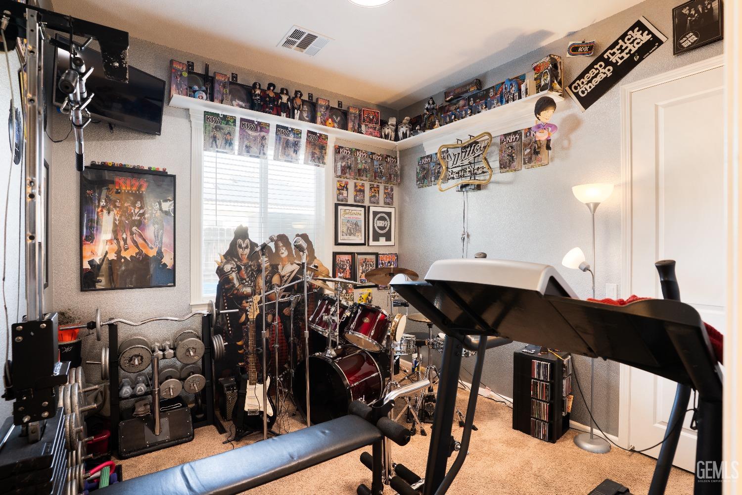 Undisclosed Address Bakersfield, CA 93314 - Photo 30 of 42 a view of a room with gym equipment