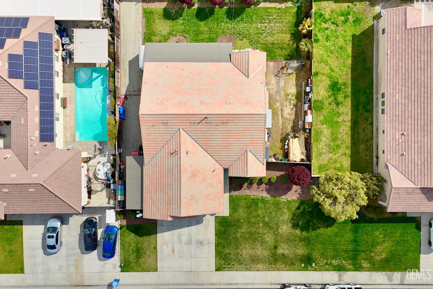 Undisclosed Address Bakersfield, CA 93314 - Photo 3 of 42 front view of a house with a street