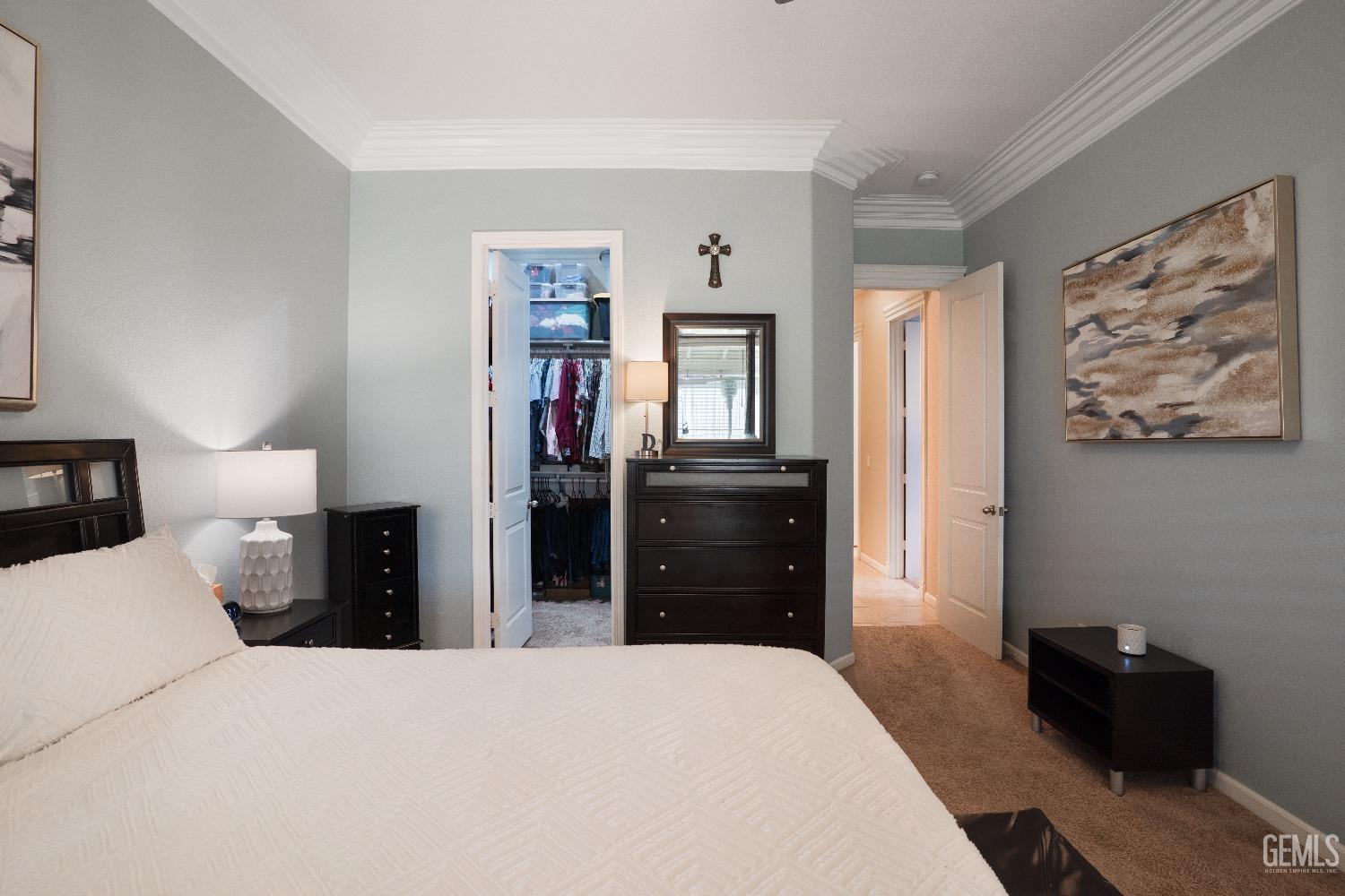 Undisclosed Address Bakersfield, CA 93314 - Photo 34 of 42 a bedroom with a bed and a dresser