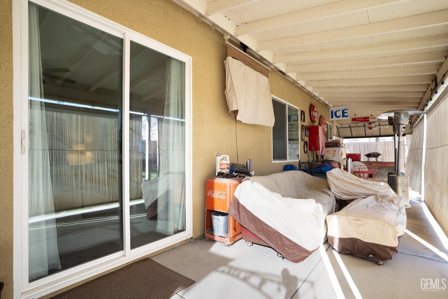 Undisclosed Address Bakersfield, CA 93314 - Photo 37 of 42 a living room with furniture