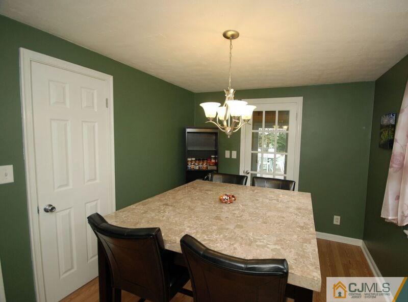 117 2nd Street Dunellen, NJ 08812 - Photo 13 of 25 a view of a dining room with furniture window and wooden floor