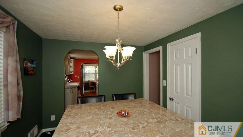 117 2nd Street Dunellen, NJ 08812 - Photo 14 of 25 a view of a living room and bathroom