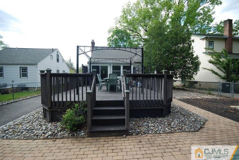 117 2nd Street Dunellen, NJ 08812 - Photo 5 of 25 a view of a house with wooden deck front of house
