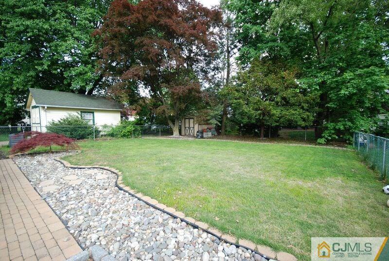 117 2nd Street Dunellen, NJ 08812 - Photo 7 of 25 a view of a house with backyard
