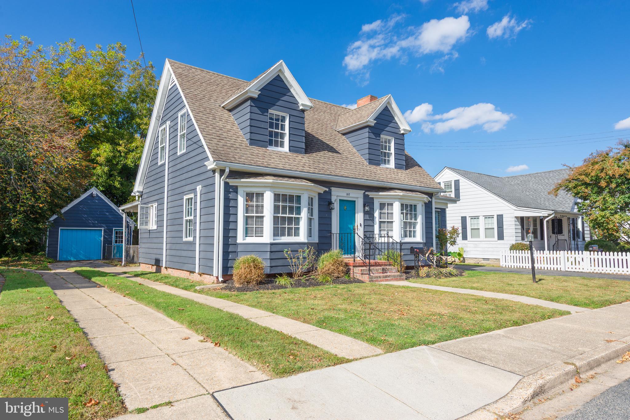 107 Rambler Road Cambridge, MD 21613 - Photo 2 of 28 a front view of a house with a yard