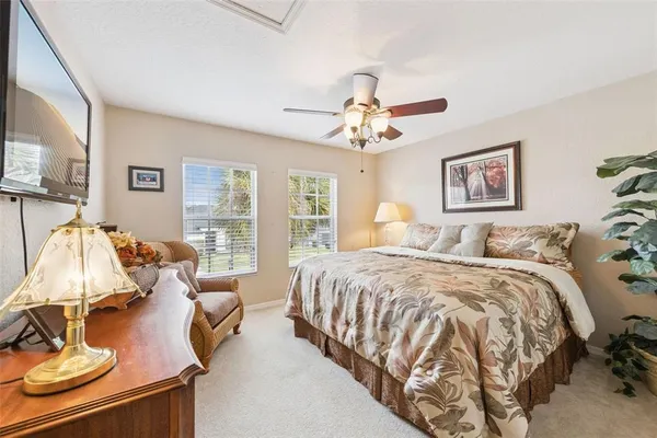 a bed room with a bed and a couch