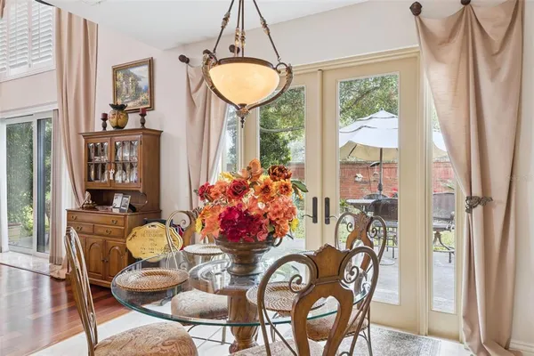 a view of a dining room with furniture window and outside view